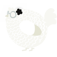 A white chicken with a lace pattern